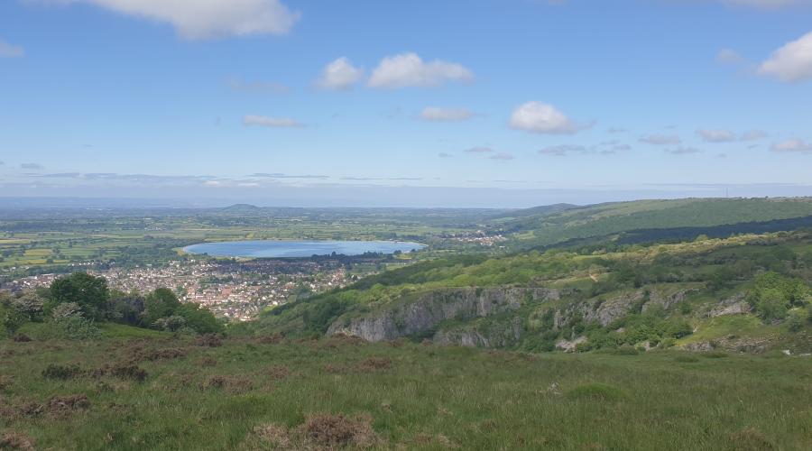 view from top of Cheddar Gorge looking out towards Cheddar Lake