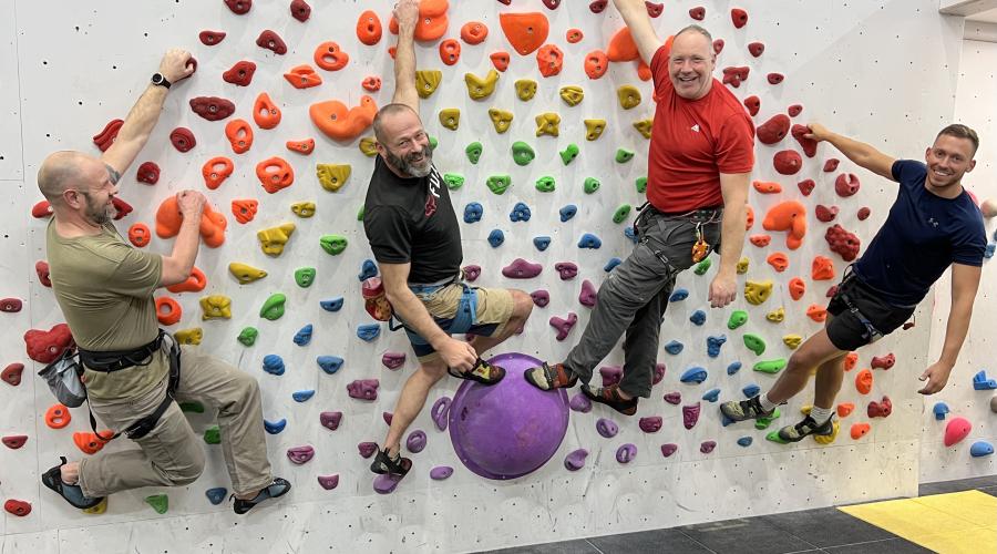 Outdoorlads climbers on the rainbow feature wall