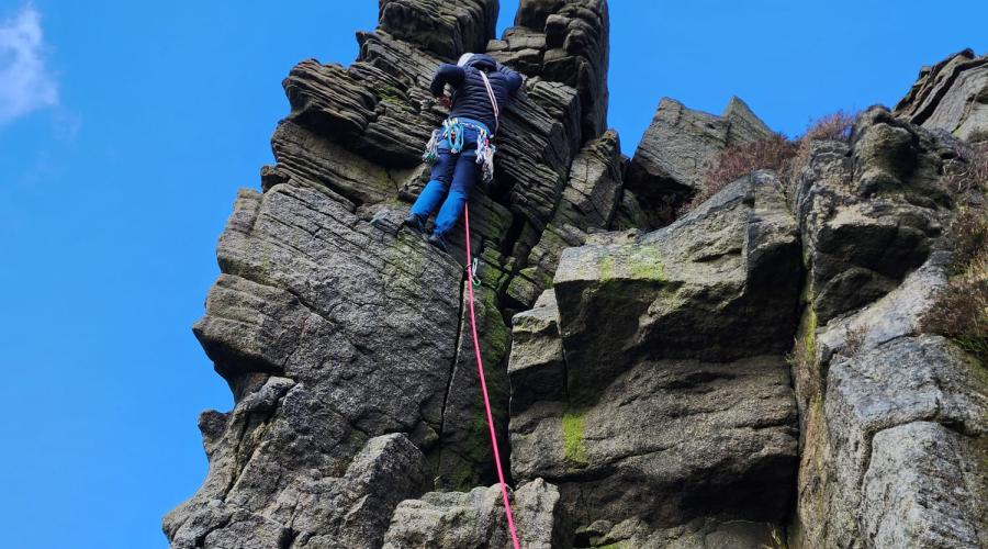 Climber on a rocky crag