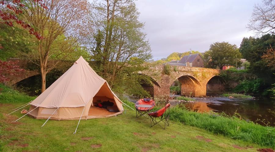 Camping on the Riverbank, adjacent to the bridge