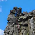 Climber on a rocky crag