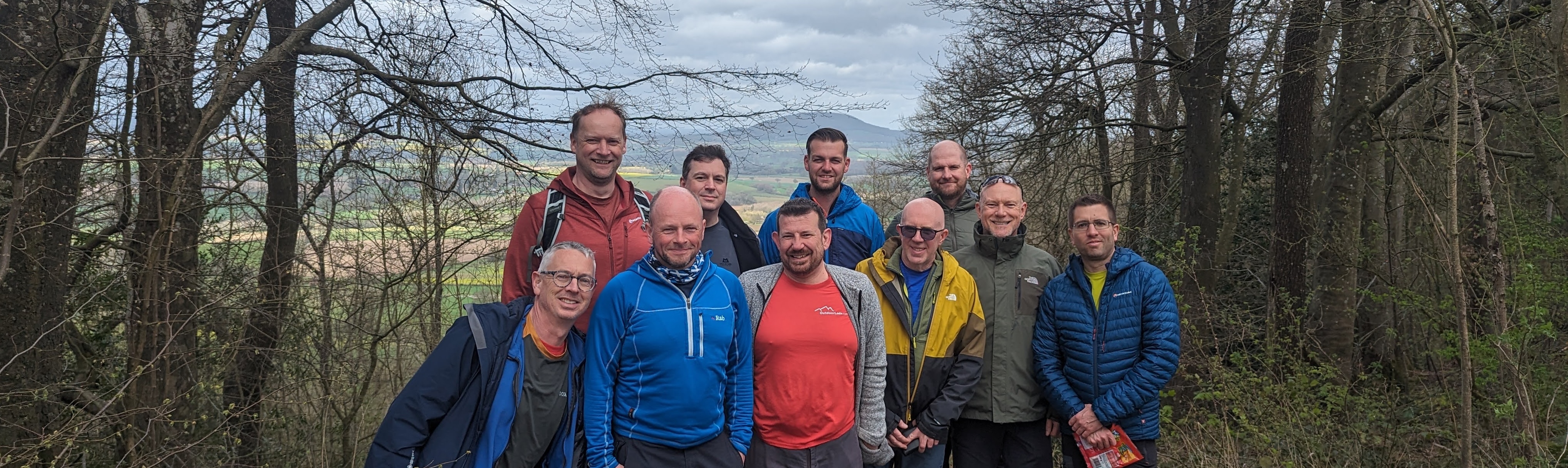 Trustees and RCs in a wooded area